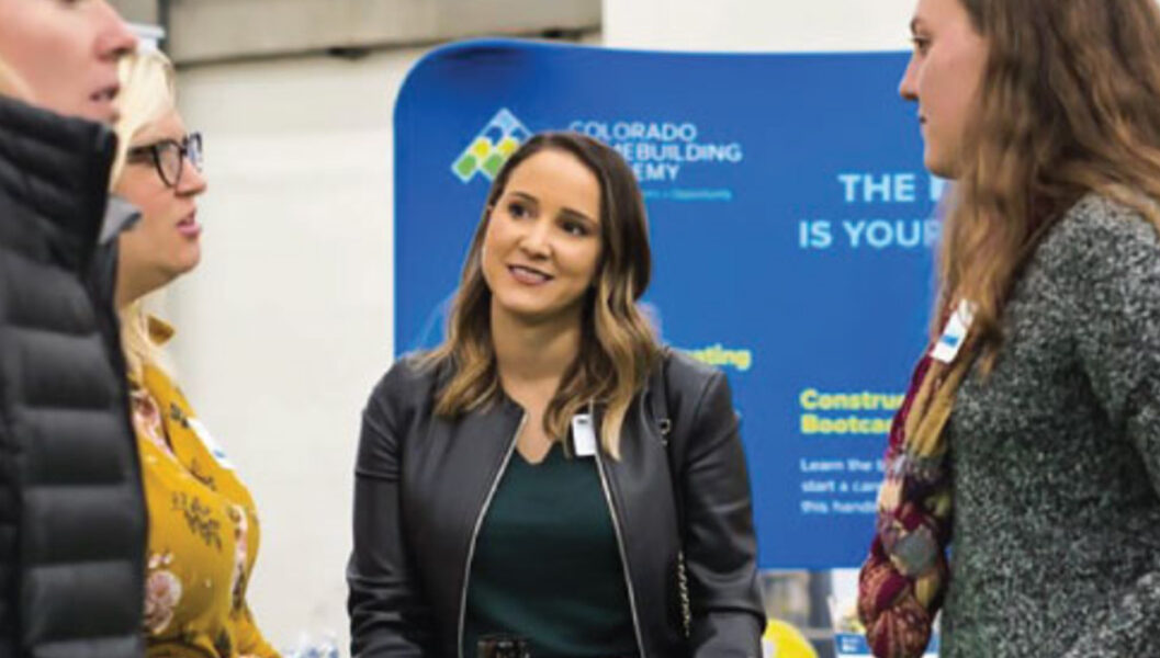 Women discussing construction trades