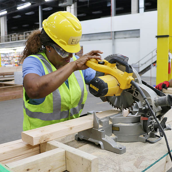 Student cutting wood