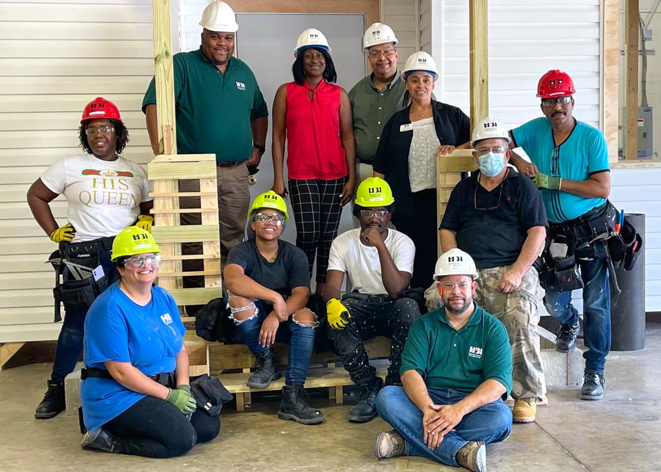 Construction students and instructor