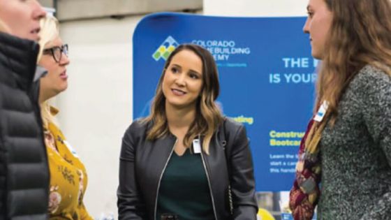 Women discussing construction trades