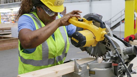Student cutting wood
